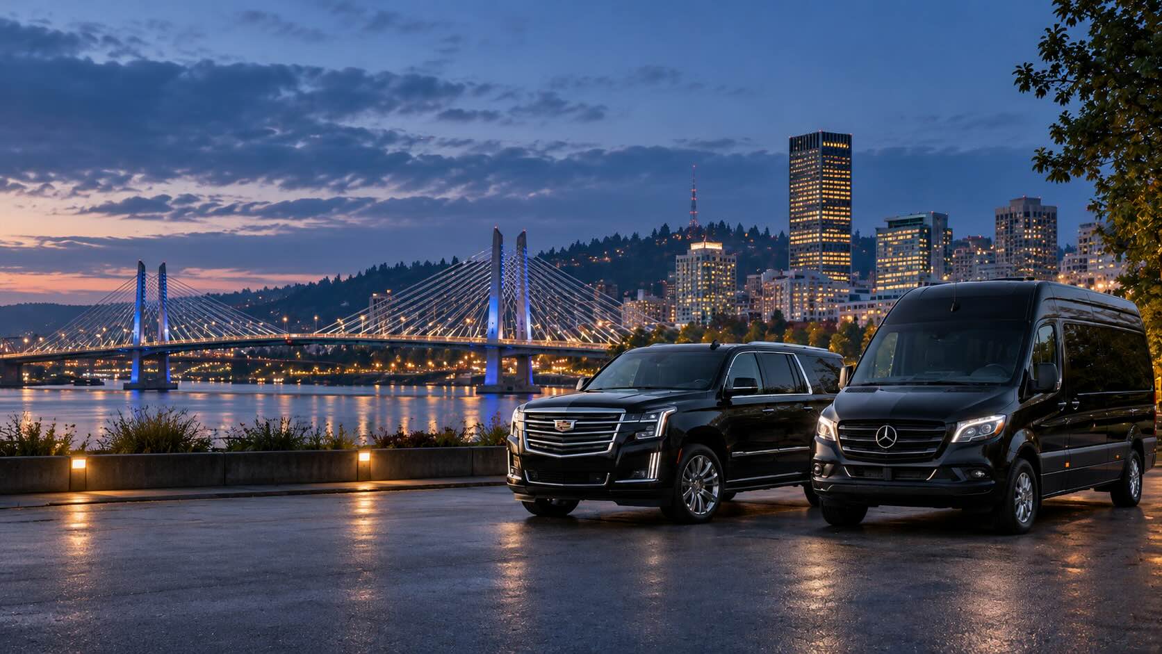 Chauffeured SUV and Sprinter on the Portland waterfront at dusk